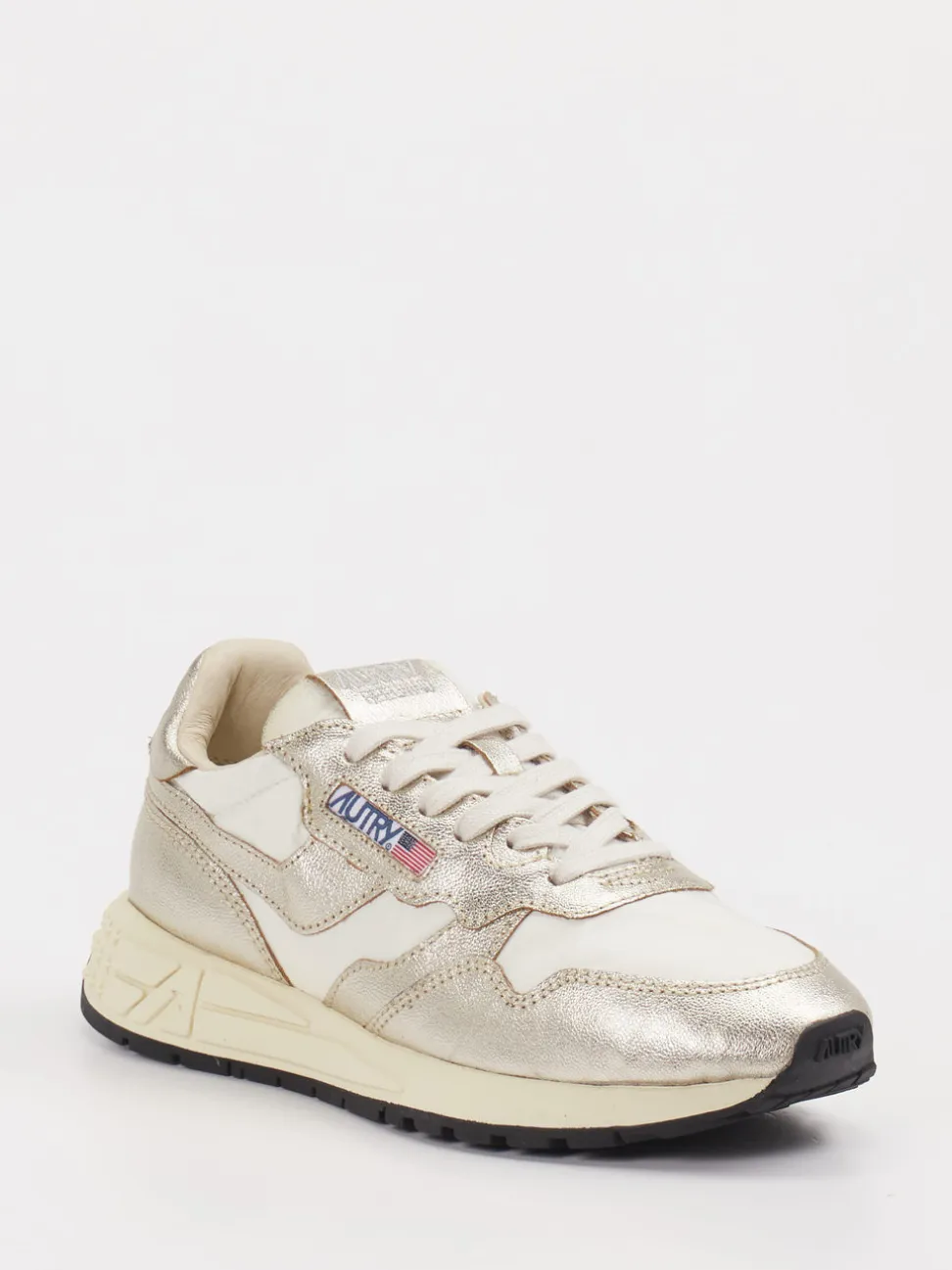 Autry – Sneaker aus Metallic-Leder in Beige-Gold