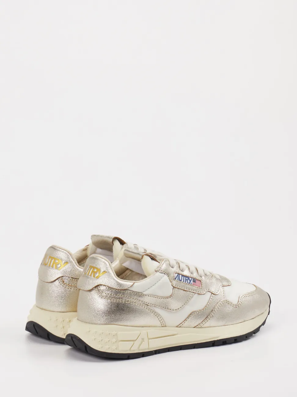 Autry – Sneaker aus Metallic-Leder in Beige-Gold