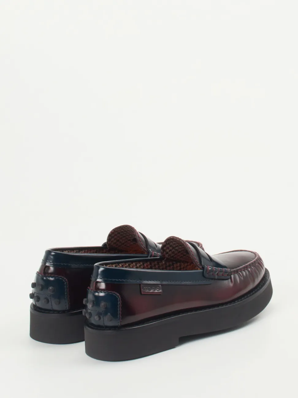 Tod's – Loafer aus Hochglanzleder in Bordeauxrot